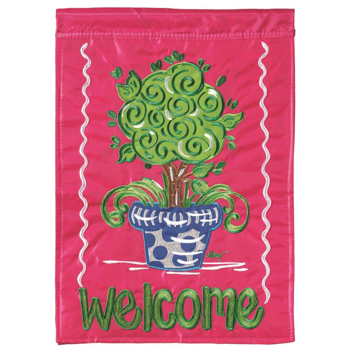 Double-applique 13x18 Welcome Topiary garden flag showing floral topiary and stitched details, displayed outdoors on a standard stand near entry steps