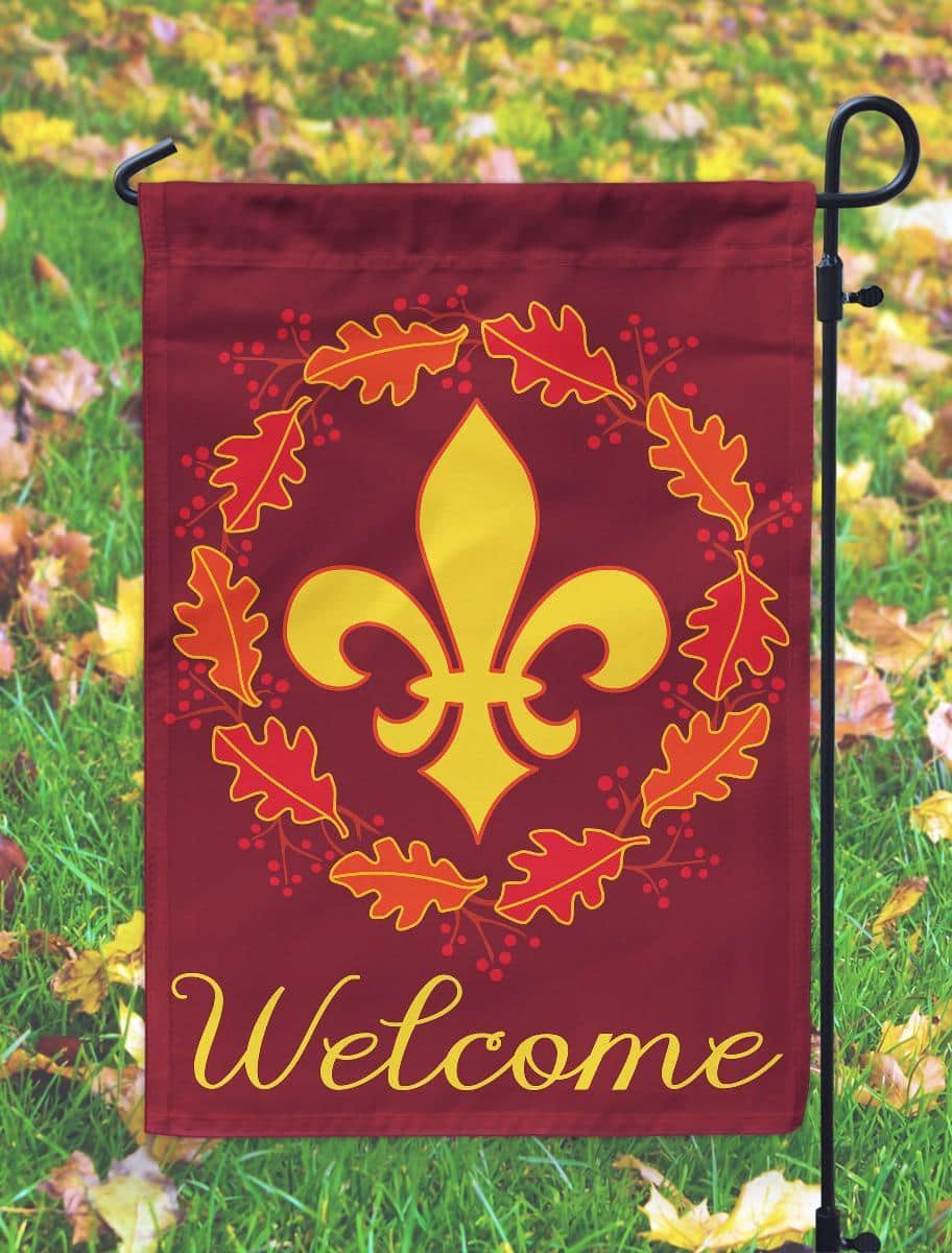 13x18 Welcome Wreath Fleur-De-Lis double applique garden flag with winter palette, textured applique wreath and fleur-de-lis on a reinforced pole sleeve for garden display.