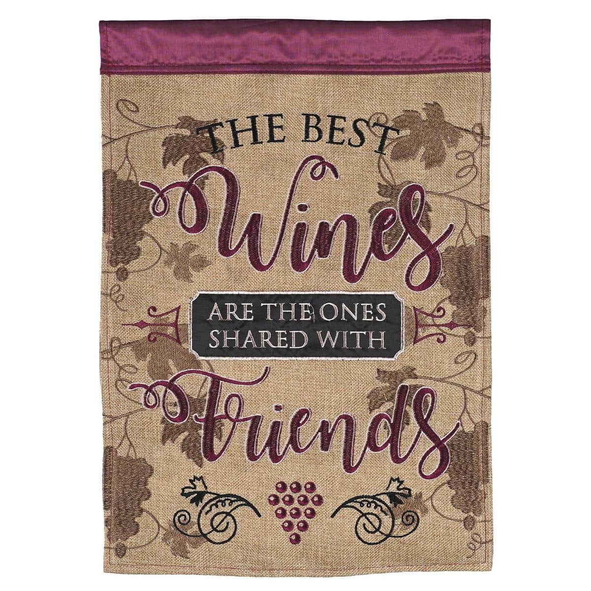 Double applique 13x18 "Wines Shared With Friends" garden flag showing two clinking wine glasses and grape vine accents in layered fabric applique, ideal for patios, porches, and outdoor entertaining.