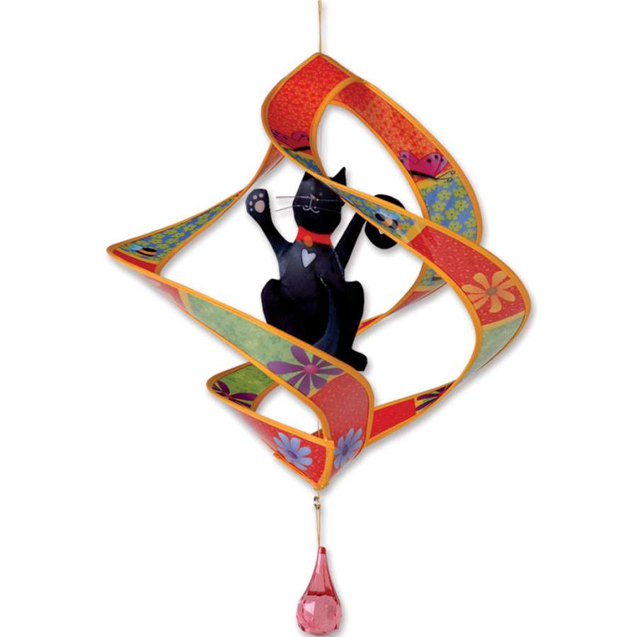 Accent Twirly garden charm with colorful blades and satin central icon, delightfully hanging from a porch in a sunny garden.