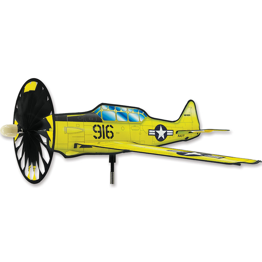 Airplane Spinner - Texan T6 spinning gracefully in a garden, showcasing its detailed design and vibrant colors, perfect for outdoor decor.