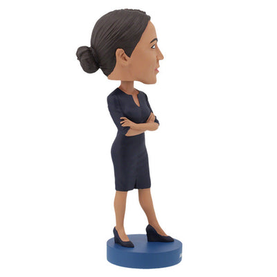 Alexandria Ocasio-Cortez bobblehead displaying intricate details, hand-painted and crafted from heavyweight polyresin with a vibrant finish.