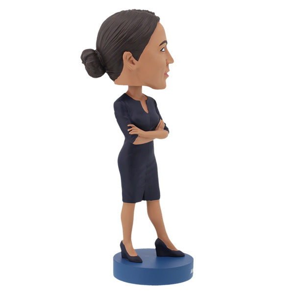 Alexandria Ocasio-Cortez bobblehead displaying intricate details, hand-painted and crafted from heavyweight polyresin with a vibrant finish.