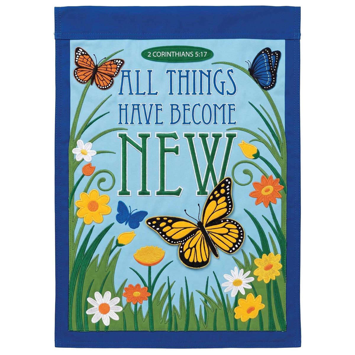 All Things Have Become New garden flag with intricate appliques and vibrant colors displayed in a garden setting, beautifully fluttering in the breeze.