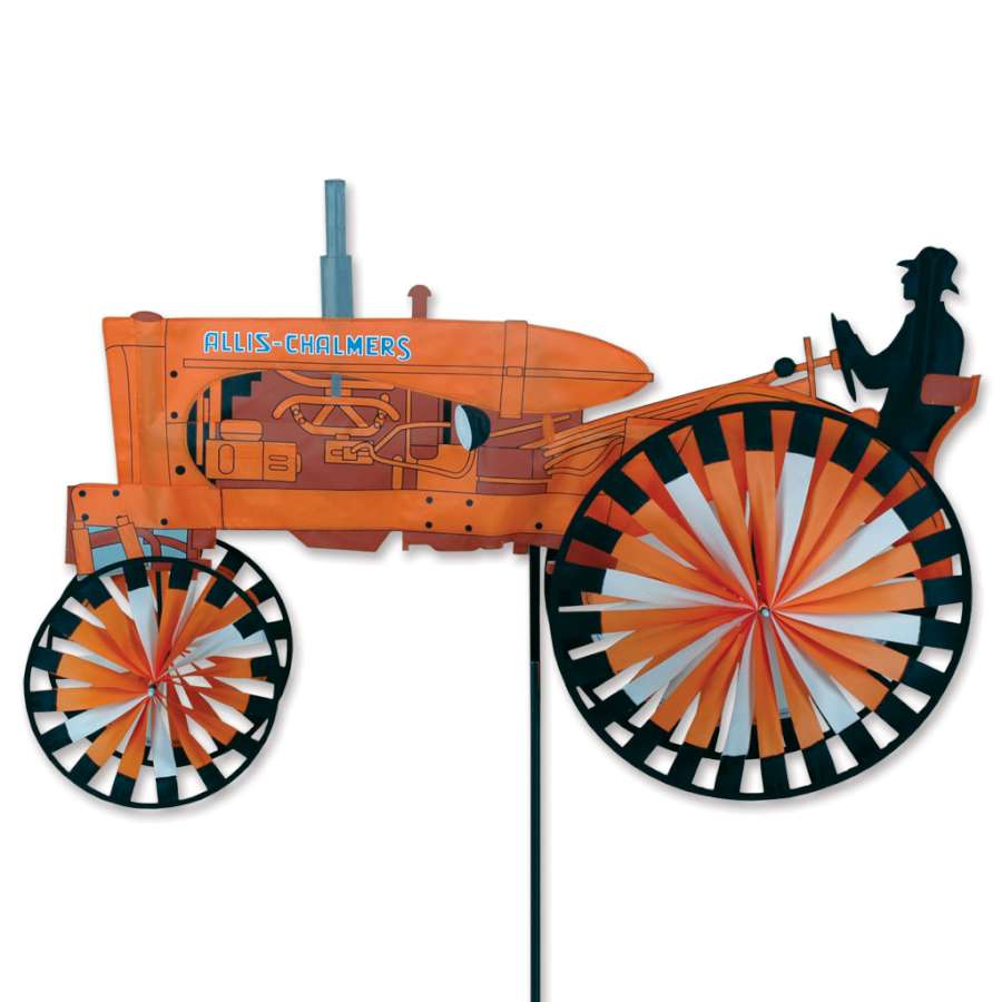 Allis Chalmers Tractor Spinner showcasing a classic tractor design, spinning gently in a garden setting under blue skies.