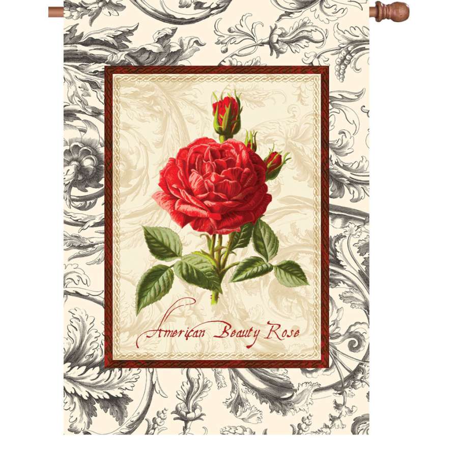 28 in. Flag featuring a vibrant American Beauty Rose design, displayed outdoors in a garden setting, showcasing its double-sided feature.
