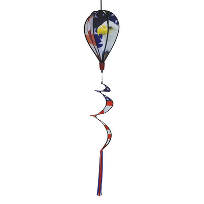 American Flag Eagle 6-Panel Hot Air Balloon displayed in a garden, showcasing vibrant colors of the American flag and a majestic bald eagle design.