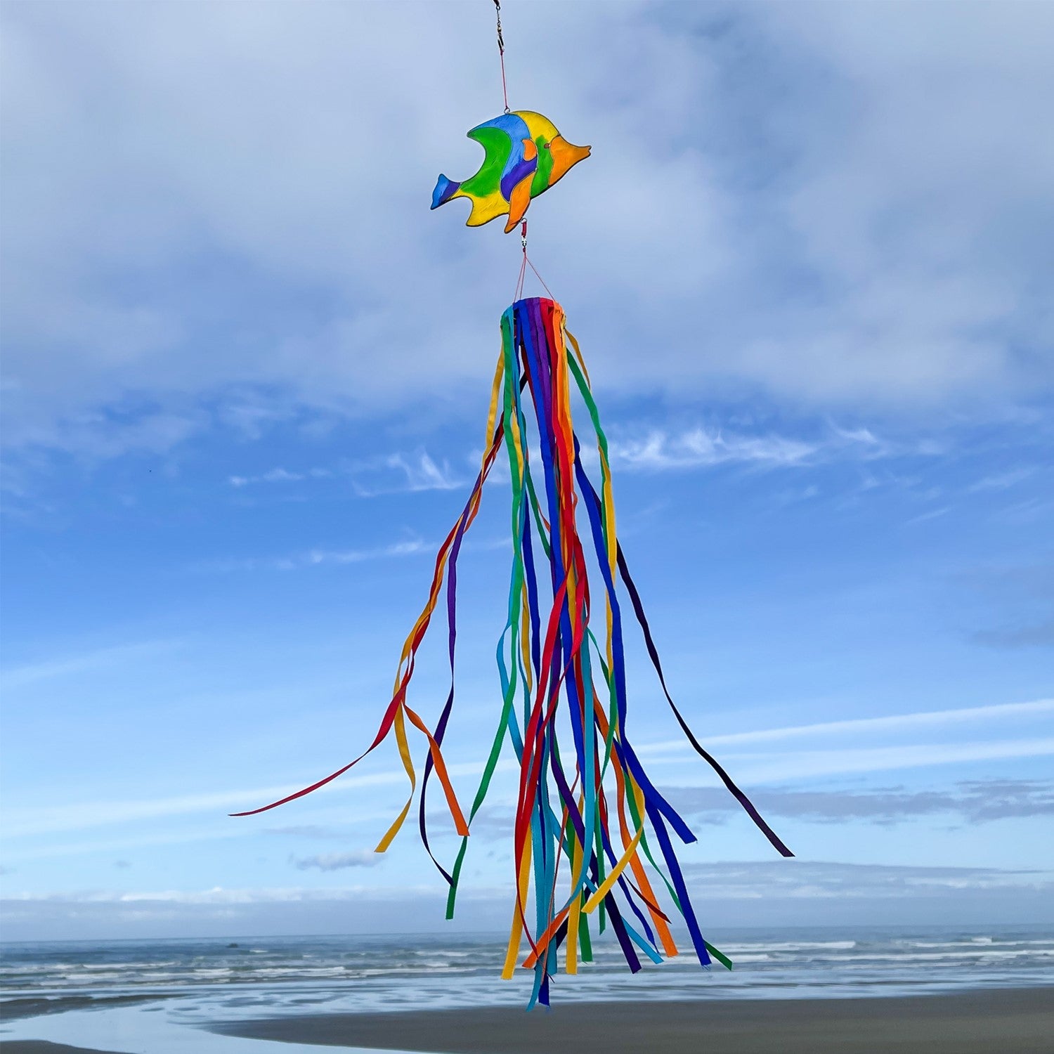 Vibrant Angel Fish & Ribbon Windsock featuring a colorful resin angel fish and shimmering rainbow satin ribbons, swaying in the breeze.