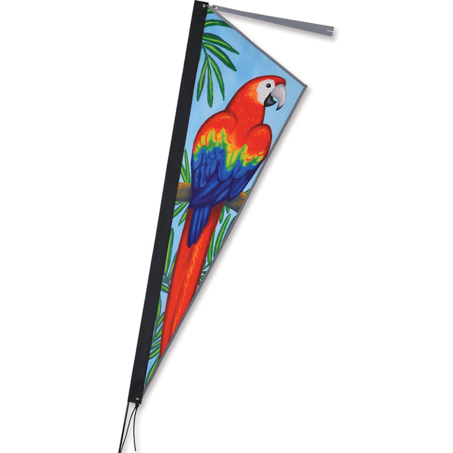 Apex Bike Flag featuring a colorful parrot design and reflective accents, displayed on a bike during a ride showing high visibility