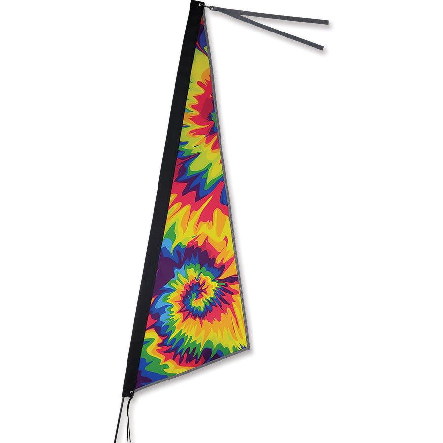 Apex Bike Flag - Tie Dye featuring a colorful design, mounted on a bike for increased visibility on the road, showcasing its bright hues.