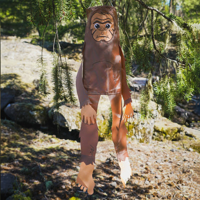 Baby Bigfoot 30" Breeze Buddy windsock featuring adorable applique and embroidery details, swaying gracefully in a garden setting.