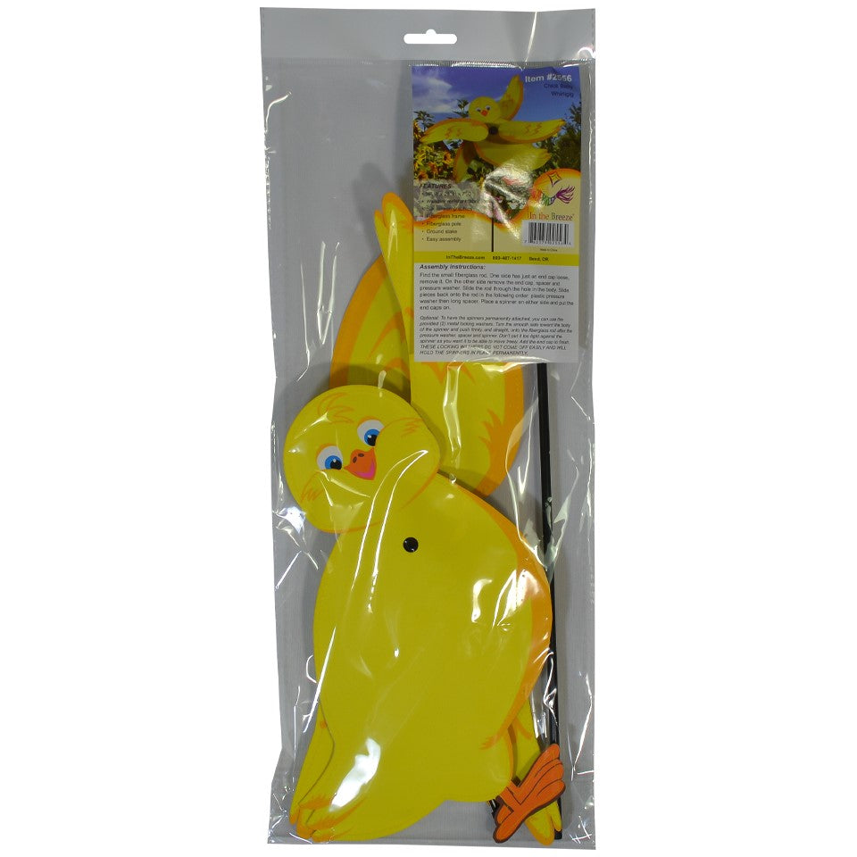 Baby Chick Whirligig featuring a cute yellow chick design spinning in the breeze in a garden setting, crafted from durable materials.