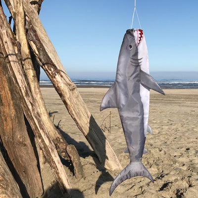 30-inch Baby Shark Fish Windsock hanging outdoors, showcasing its colorful design in a breezy setting, perfect for marine-themed decoration.