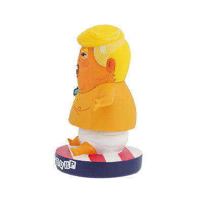 Baby Trump BobbleHIPS collectible bobblehead, humorously designed with vibrant colors, displayed on a desk, ready to entertain and amuse.