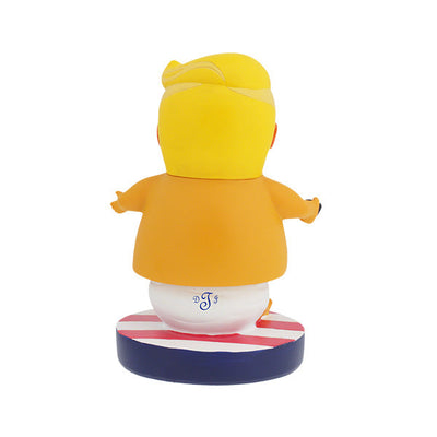 Baby Trump BobbleHIPS collectible bobblehead, humorously designed with vibrant colors, displayed on a desk, ready to entertain and amuse.