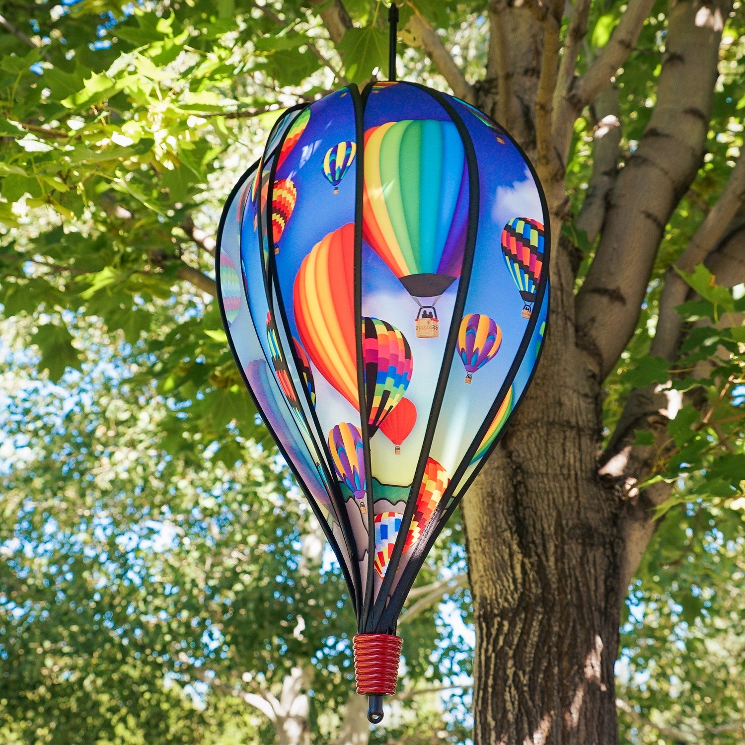 The Balloon Fest 10-Panel Hot Air Balloon Spinner features a bright and colorful design of hot air balloons spinning in the breeze, adding whimsy to your garden decor.
