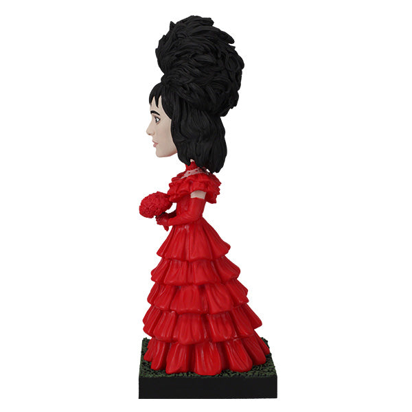 Beetlejuice Lydia Deetz Bobblehead standing 8.25 inches tall, featuring intricate details of her Red Wedding Dress, showcasing gothic elegance.
