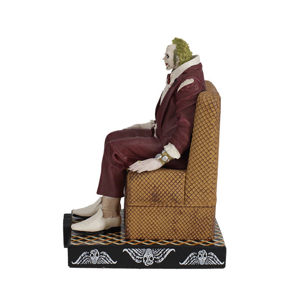 Beetlejuice Shrunken Head Bobblehead, capturing the iconic character with vibrant colors and fine detail, showcased in a collector's box.