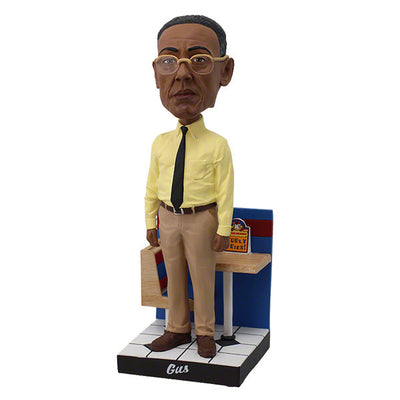 Better Call Saul Gus Fring Bobblehead standing 8 inches tall with meticulous detail, dressed in a suit, ideal for display in a collector's setting.