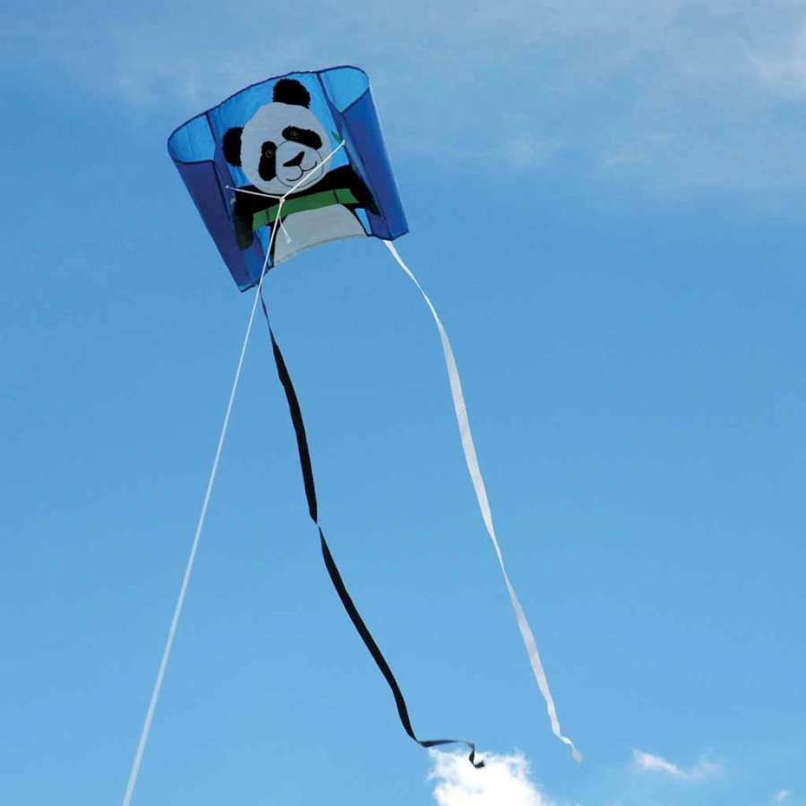 Big Back Pack Sled Kite featuring a fun panda design soaring in the sky, measuring 18x12.75 inches, designed for easy flying on a breezy day.