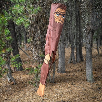 Bigger Bigfoot 72-inch Breeze Buddy, a life-sized Sasquatch windsock made of colorful weather-resistant polyester, swaying in the breeze.