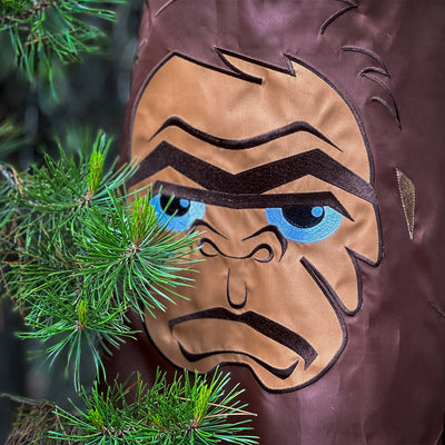 Bigger Bigfoot 72-inch Breeze Buddy, a life-sized Sasquatch windsock made of colorful weather-resistant polyester, swaying in the breeze.