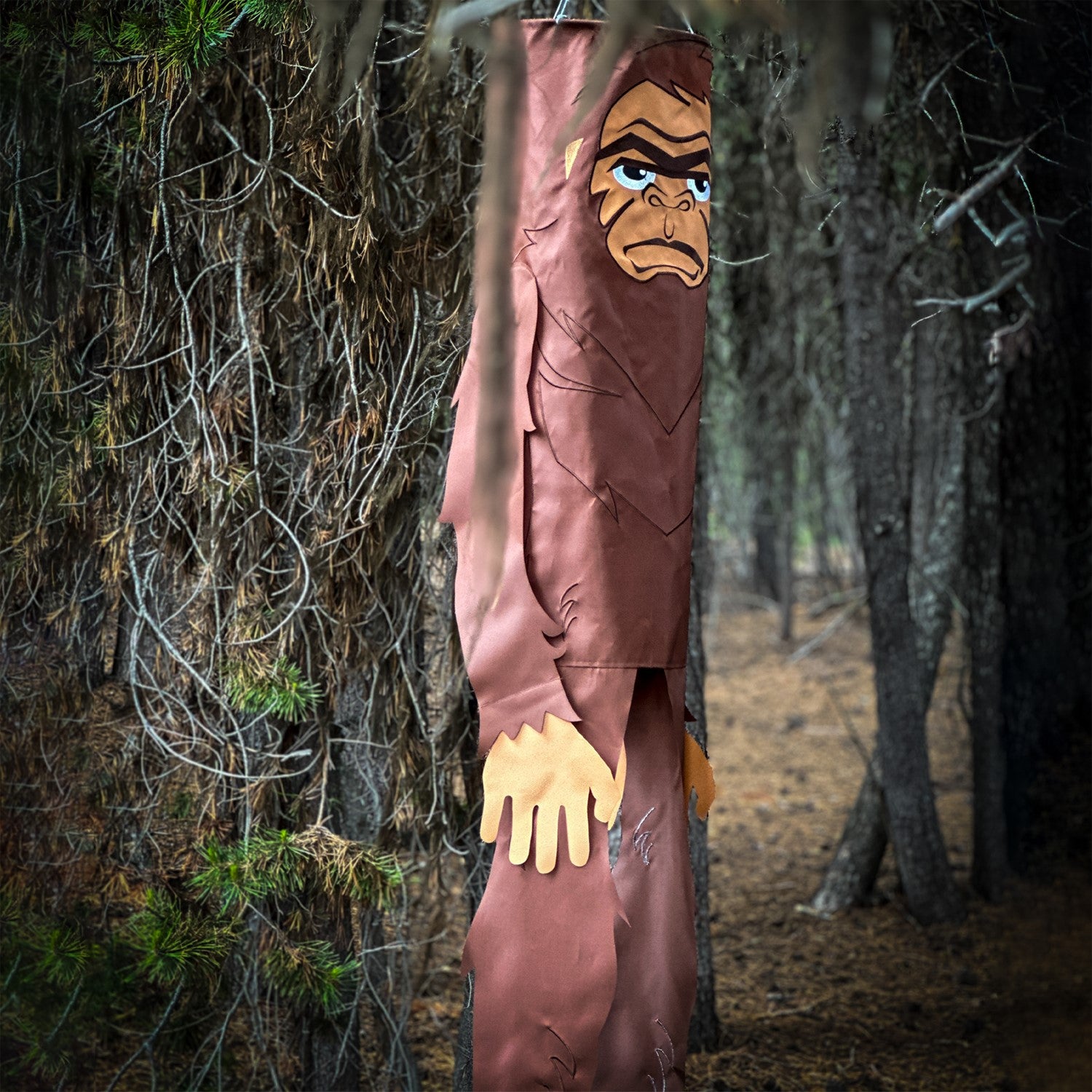 Bigger Bigfoot 72-inch Breeze Buddy, a life-sized Sasquatch windsock made of colorful weather-resistant polyester, swaying in the breeze.