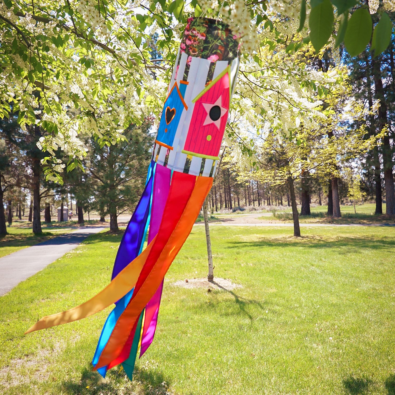 Birdhouse Garden 40-inch windsock with colorful designs of birdhouses and free-flowing tails fluttering in the wind, adding charm to any garden.