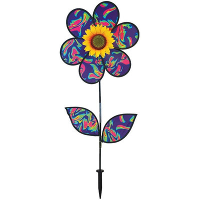 16 inch Blue Psychedelic Flower with Leaves garden spinner showcasing six petals, sunflower center, and leaves attached to a stand in a vibrant outdoor setting.