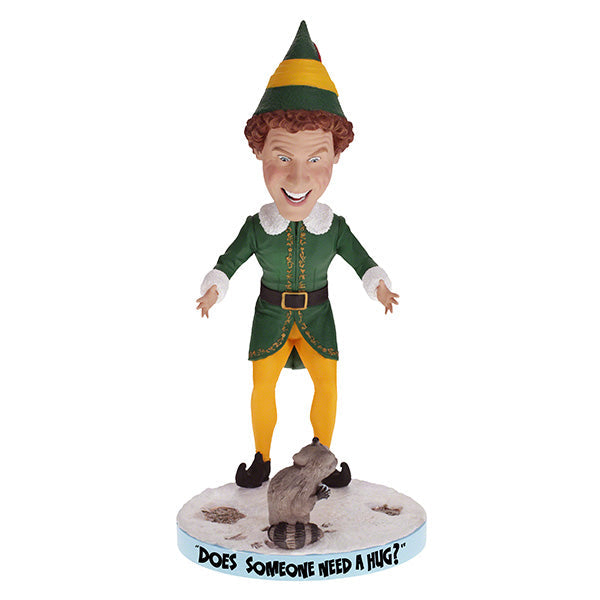 Buddy the Elf with Raccoon bobblehead standing on a shelf, showcasing vibrant colors and playful design, perfect for holiday decor.