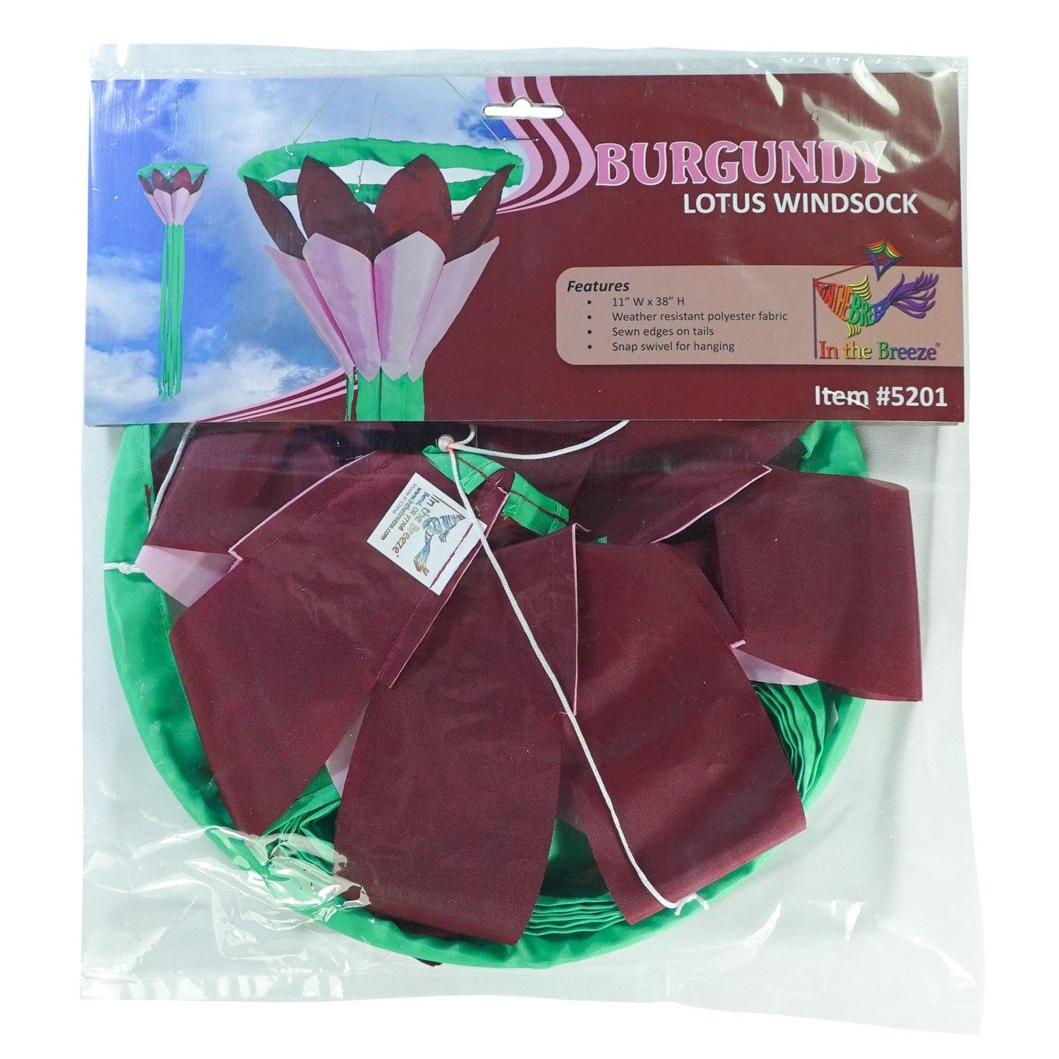 Burgundy 38' Lotus Flower Windsock with colorful petals and flowing green tails swaying gently in the breeze, enhancing a garden space.