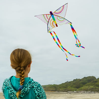 Butterfly 23\" Coloring Kite with blank surface for coloring, featuring rainbow stripe tails flying against a clear blue sky.
