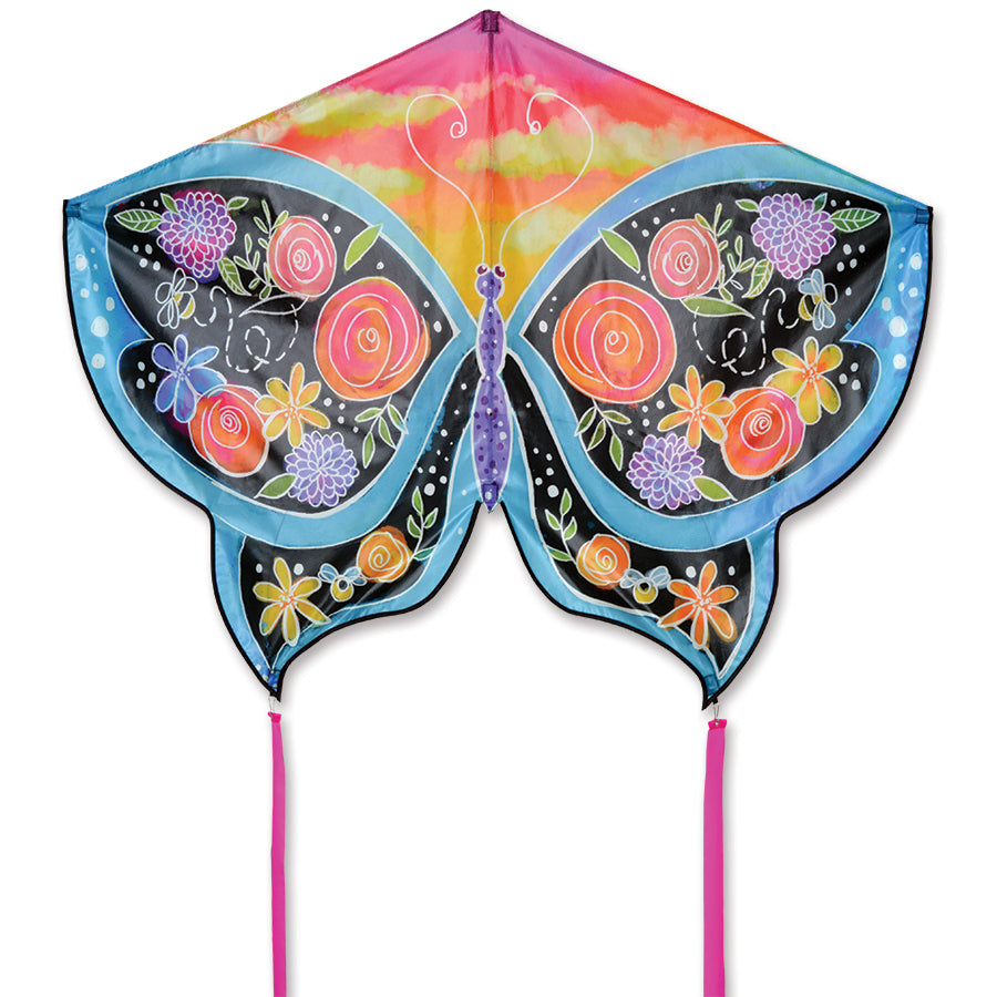 Brightly colored Butterfly Kite measuring 52x37 inches soaring in the sky, showcasing floral designs against a clear blue background.