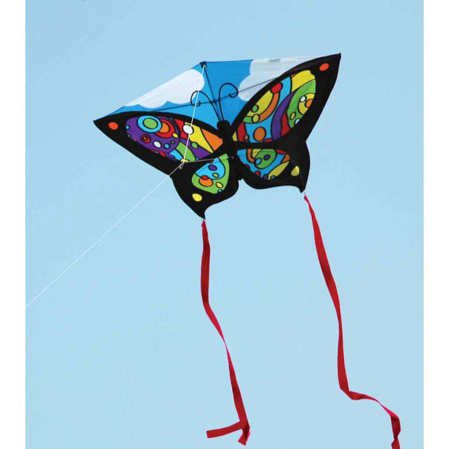 Butterfly Kite - Rainbow Orbit soaring in a clear sky, showcasing its vibrant butterfly design and ripstop polyester fabric against the sun.