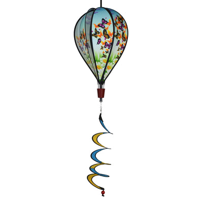 Butterfly Swarm Hot Air Balloon spinning in a garden, featuring colorful butterfly graphics and clear plastic mount for stability.