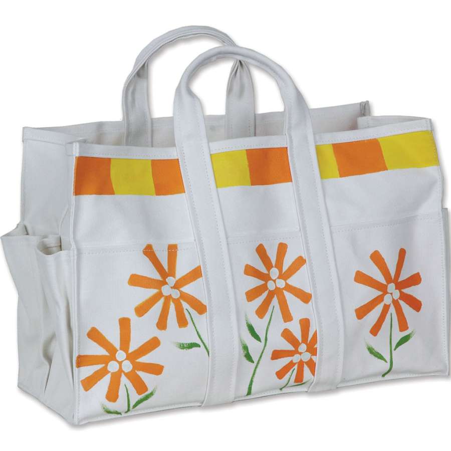 Canvas Tote Bag & Gloves - Daisies with hand-painted flower design and multiple pockets, shown on a garden bench filled with tools.