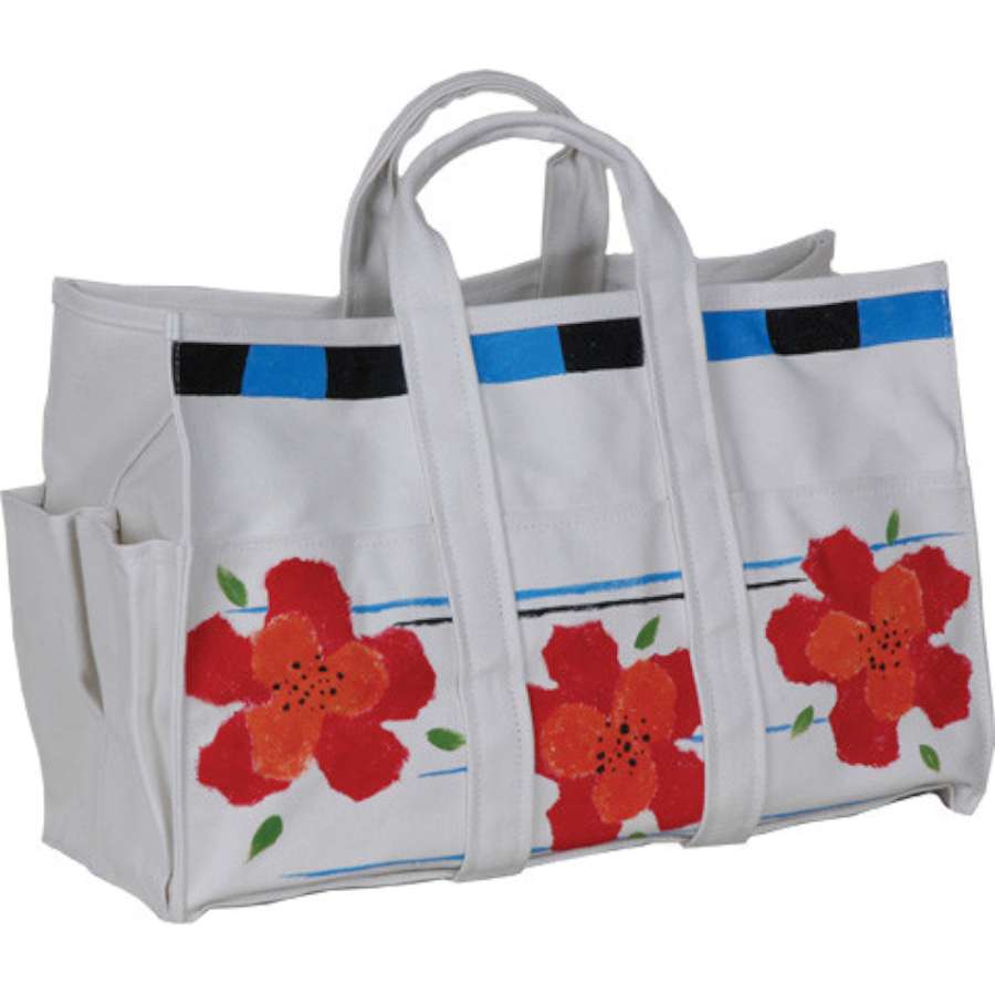 Elegant Canvas Tote Bag & Gloves - Petit Fleur with unique hand-painted design, displayed filled with gardening tools and flowers in a sunny garden setting.