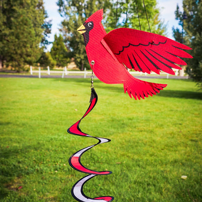 Cardinal Theme Twister featuring a vibrant red cardinal design with 3D wings, spinning in the wind against a clear sky backdrop.