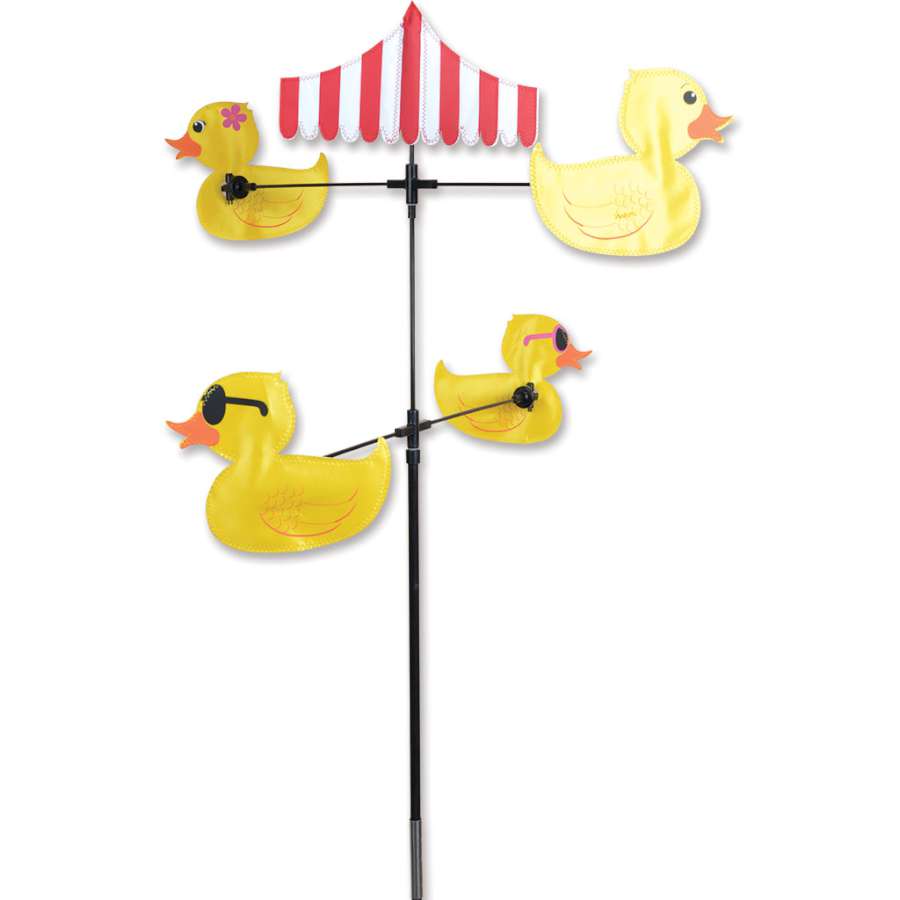 Carousel Spinner featuring rubber duck designs spinning gracefully in a garden, showcasing playful and colorful outdoor decor.