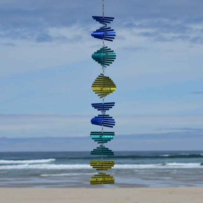 Cascade Stacked Shimmer Helix Spinner in captivating colors, spinning elegantly in the wind, designed for outdoor and indoor decor.