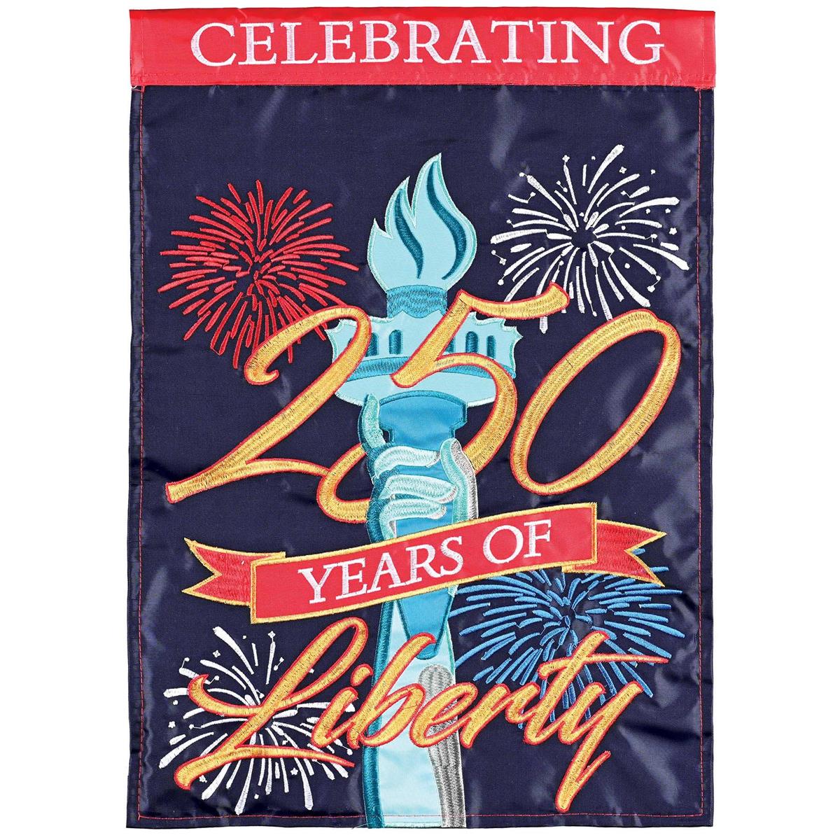 Celebrating 250 Years garden flag featuring intricate embroidery and fabric appliques displayed in a garden setting, measuring 13x18 inches.