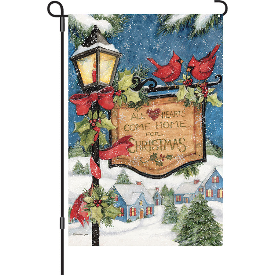 13 in. Elite Oversized Garden Flag featuring a Christmas lightpost draped with red bows and cardinals, displayed on a garden flag pole.