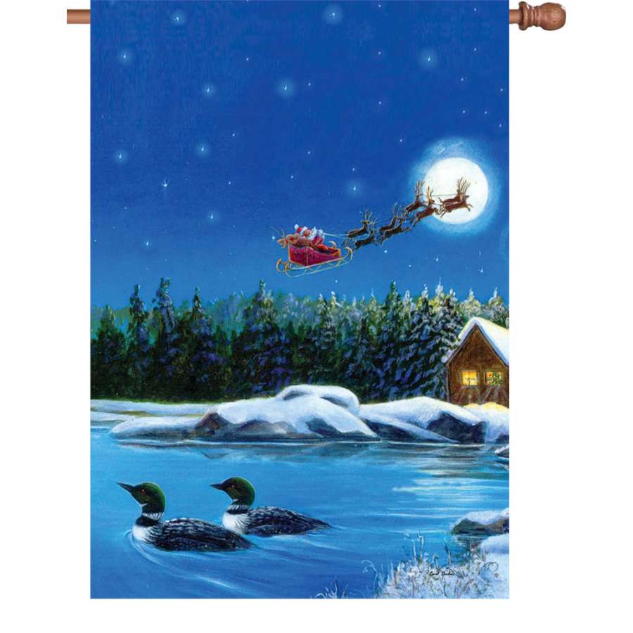 28 in. illuminated Christmas Loons flag featuring colorful loons and holiday designs displayed proudly in a winter garden setting.