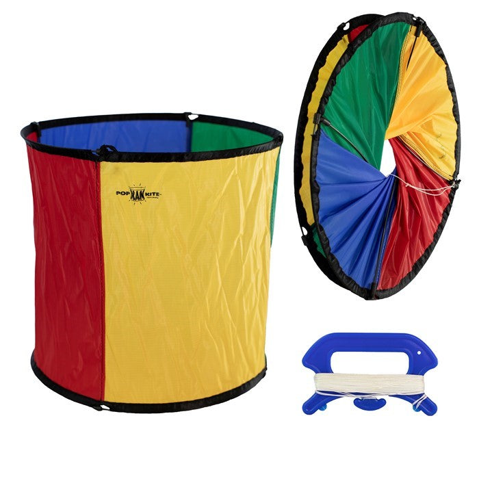 Circus Pop Kan Kite in vibrant colors flying in the sky, demonstrating its twist-and-pop design for easy outdoor enjoyment.