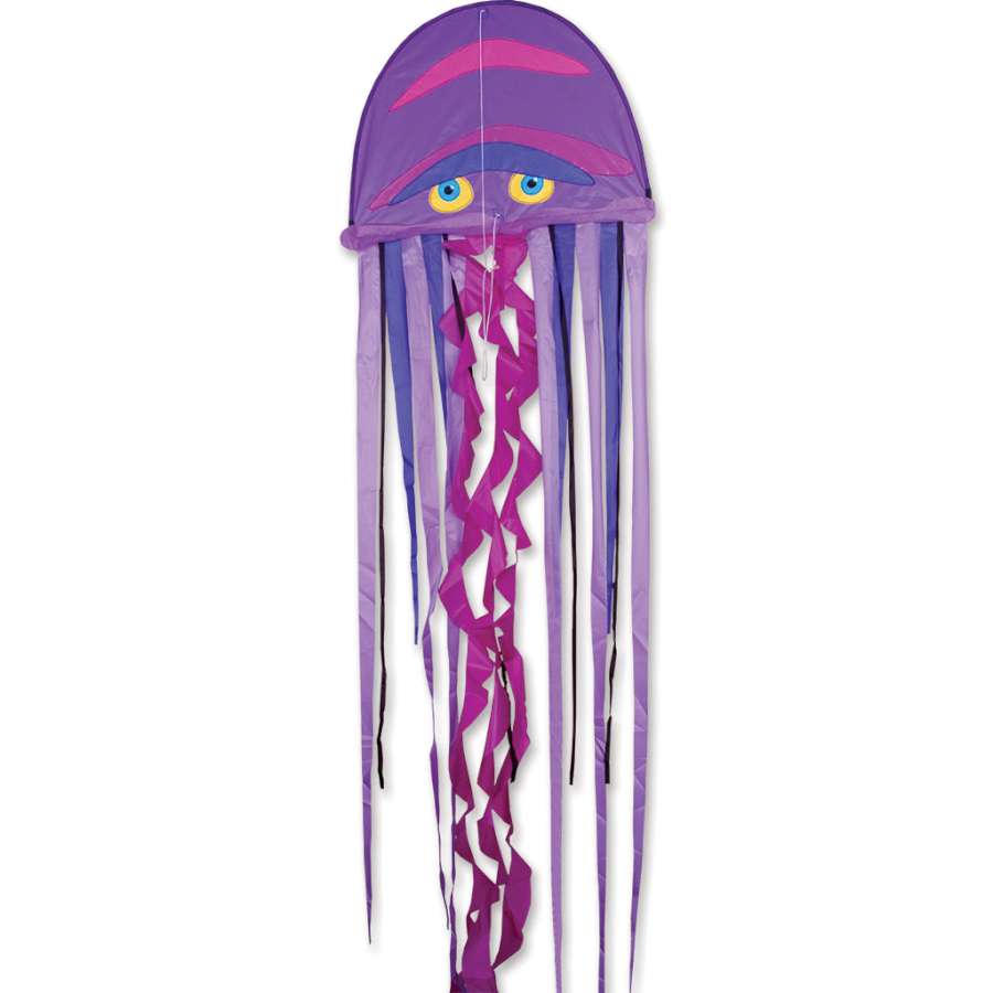 Cool Jellyfish Kite with vibrant colors and long tails drifting high in the sky during a sunny day at the beach.