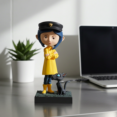 6.5 inch Coraline and The Cat Bobblehead featuring Coraline in a yellow raincoat with a cat, beautifully detailed, and made of premium resin.