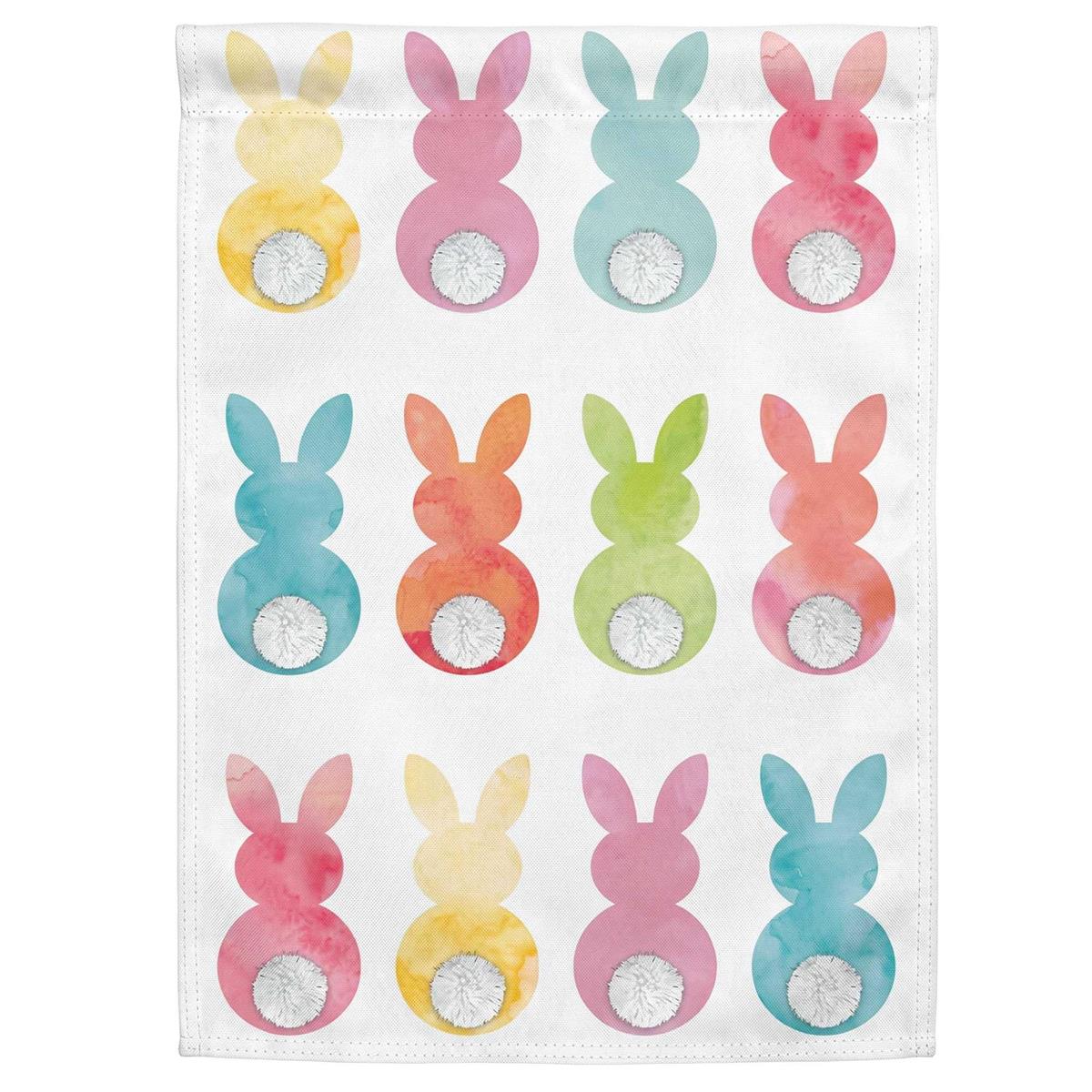 Cotton Tailed Easter Bunnies vibrant garden flag featuring colorful bunnies, displayed in a garden setting, perfect for spring celebrations.