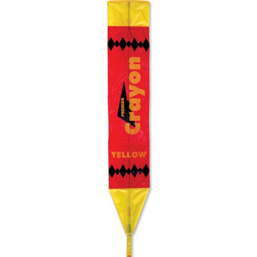 Vibrant yellow Crayon Kite measuring 8x60 inches soaring against a bright blue sky, showcasing its playful design.