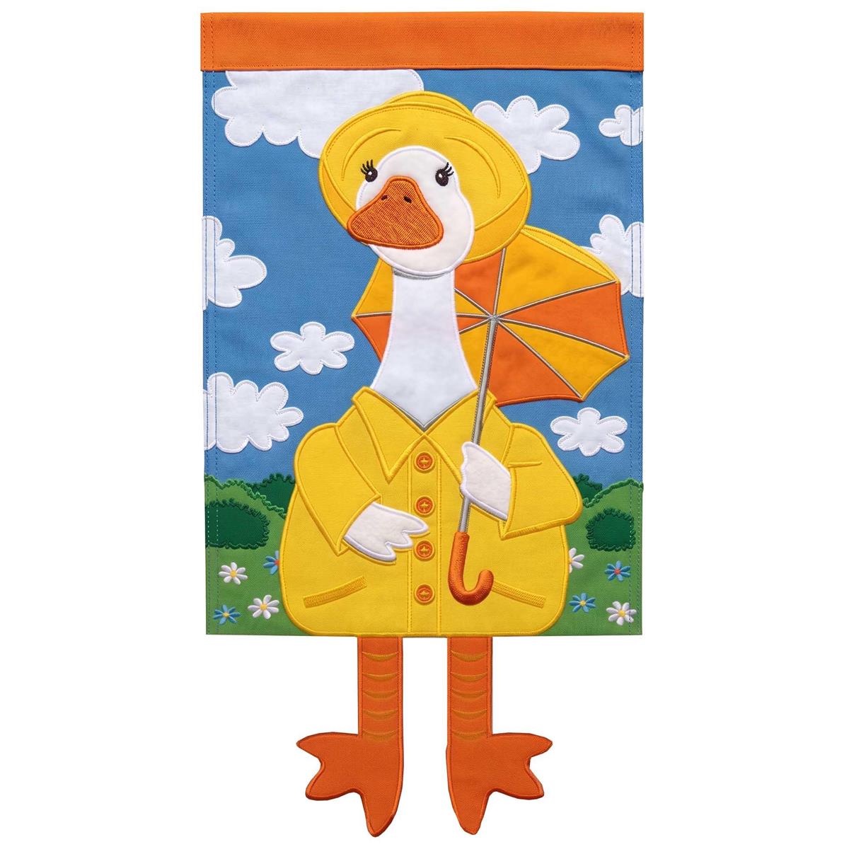Crazy Leg Goose In Rain Coat garden flag featuring a playful goose design with dangling legs, displayed outdoors in a garden setting.