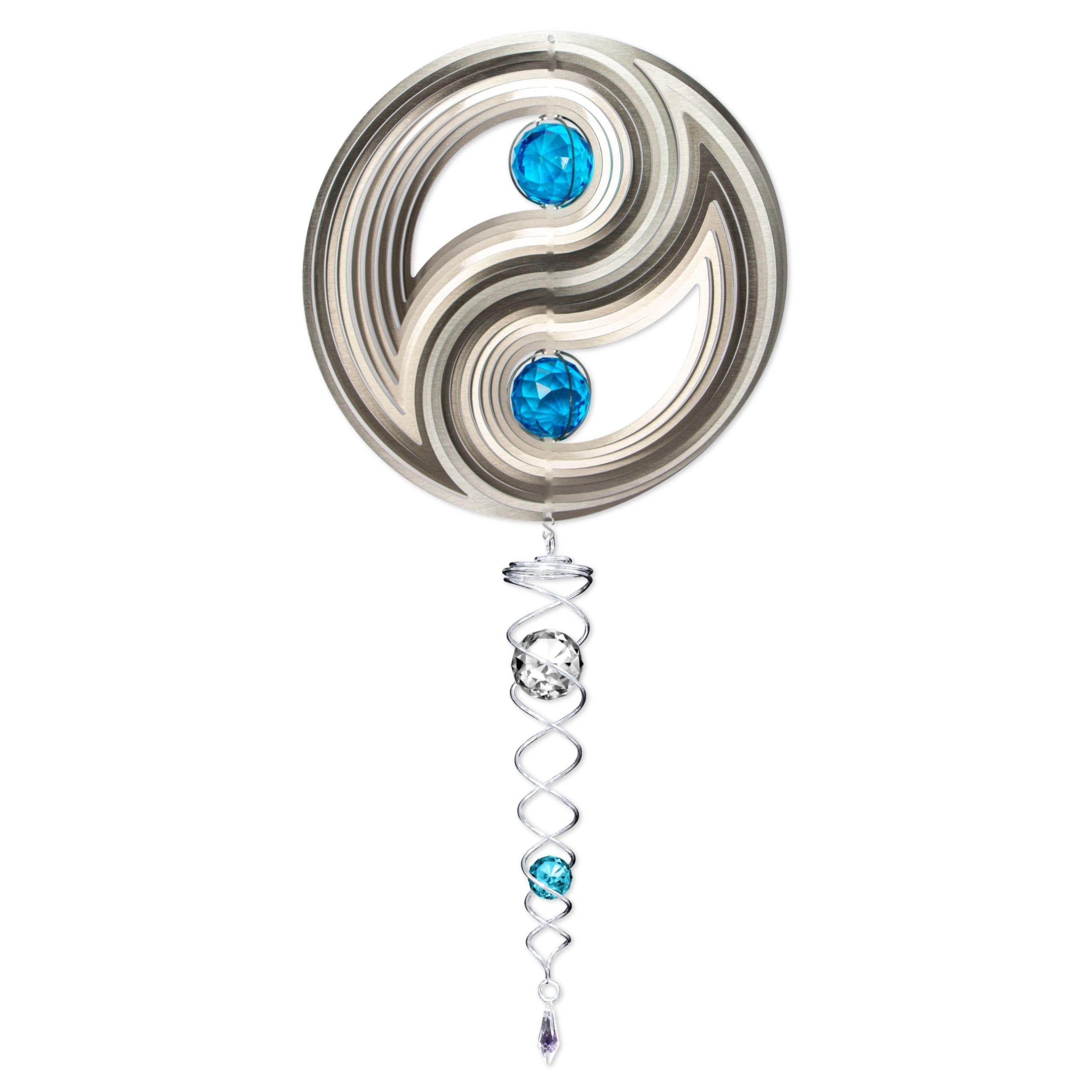 Crystal Yin Yang wind spinner set featuring a sparkly centerpiece and twister, displayed in a vibrant garden setting, catching sunlight beautifully.